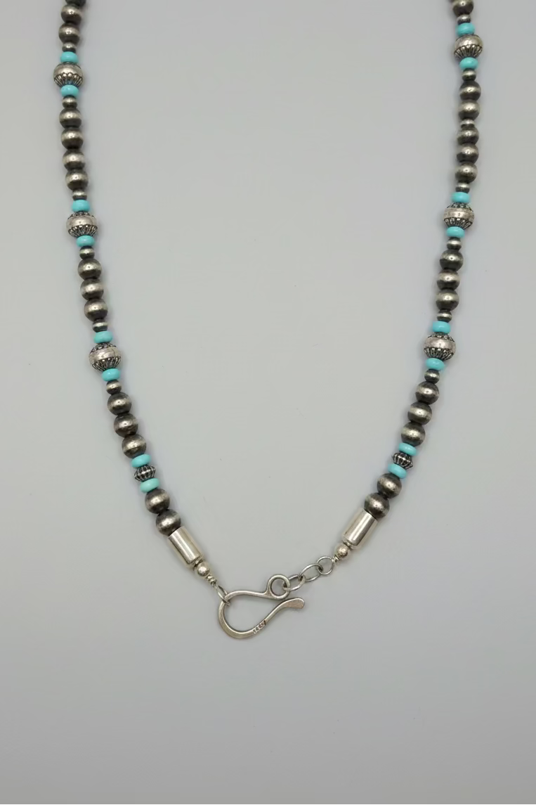 Turquoise and stamped Pearl Necklace
